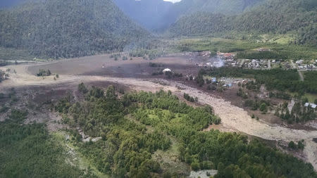 Damage done by a landslide is seen in Villa Santa Lucia, Los Lagos, Chile December 16, 2017 in this picture obtained from social media. CARABINEROS DE CHILE/via REUTERS