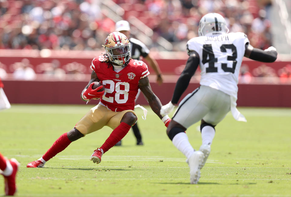 SANTA CLARA, CALIFORNIA - AUGUST 29: Trey Sermon #28 of the San Francisco 49ers runs with the ball during their preseason game against the Las Vegas Raiders at Levi's Stadium on August 29, 2021 in Santa Clara, California. (Photo by Ezra Shaw/Getty Images)