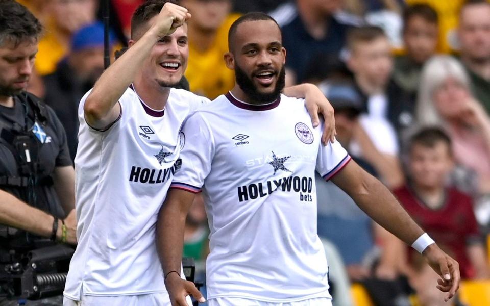 Brentford's Bryan Mbeumo celebrates scoring their second goal with Sergi Canos. - REUTERS/Tony Obrien