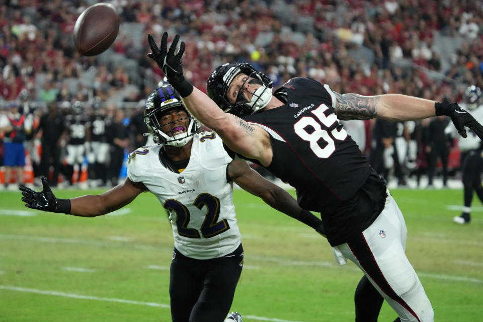 Arizona Cardinals tight end Trey McBride (85) can't make the catch as Baltimore Ravens cornerback Damarion Williams (22) defends during the first half of an NFL preseason football game, Sunday, Aug. 21, 2022, in Glendale, Ariz. (AP Photo/Rick Scuteri)