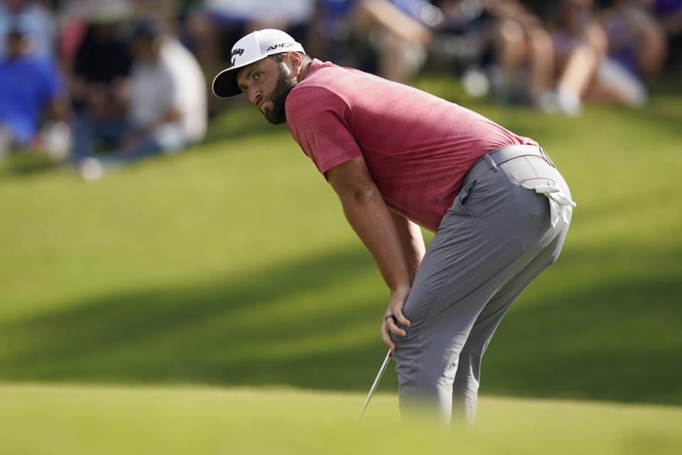 Jon Rahm reacts after missing a putt on the 14th hole during the final round of play in the Tour Championship golf tournament at East Lake Golf Club, Sunday, Sept. 5, 2021, in Atlanta. Rahm finished in second place behind Patrick Cantlay. (AP Photo/Brynn Anderson)