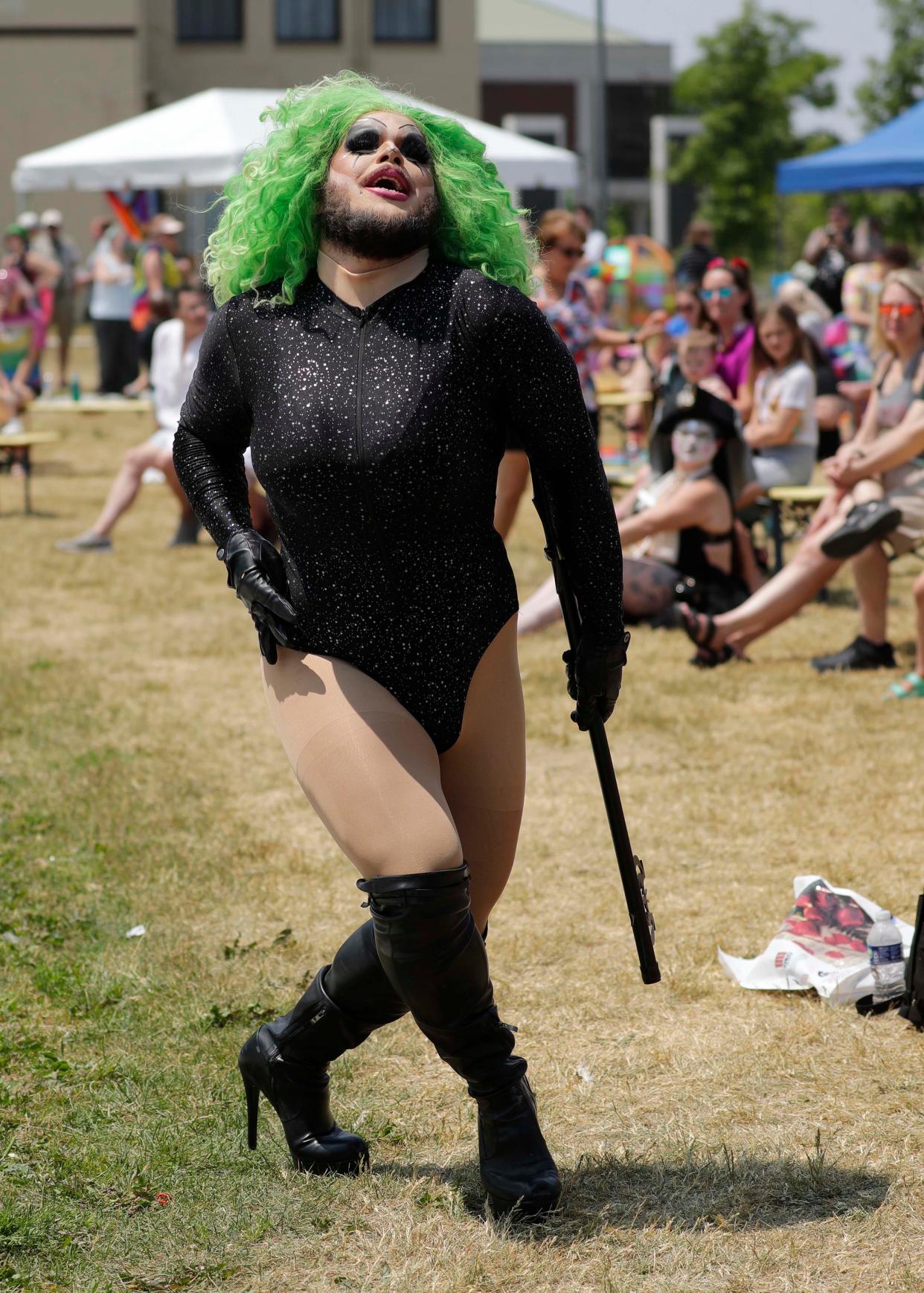 A drag performer dances during the Sheboygan County LGBTQ Alliance’s Pride Picnic in Sheboygan at City Green, Saturday, June 24, 2023, in Sheboygan, Wis.