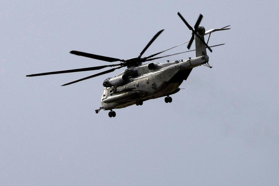 A Marine CH-53E Super Stallion helicopter flies during training at Marine Corps Air Station Miramar in San Diego. A Marine Corps helicopter, like the one pictured, had been missing with five troops aboard in a mountainous area outside San Diego.