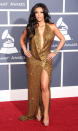 Kardashian modeled a Kaufman Franco floor-length gown with a high slit and low cut At the 53rd Annual Grammy Awards in L.A. on February 13, 2011.