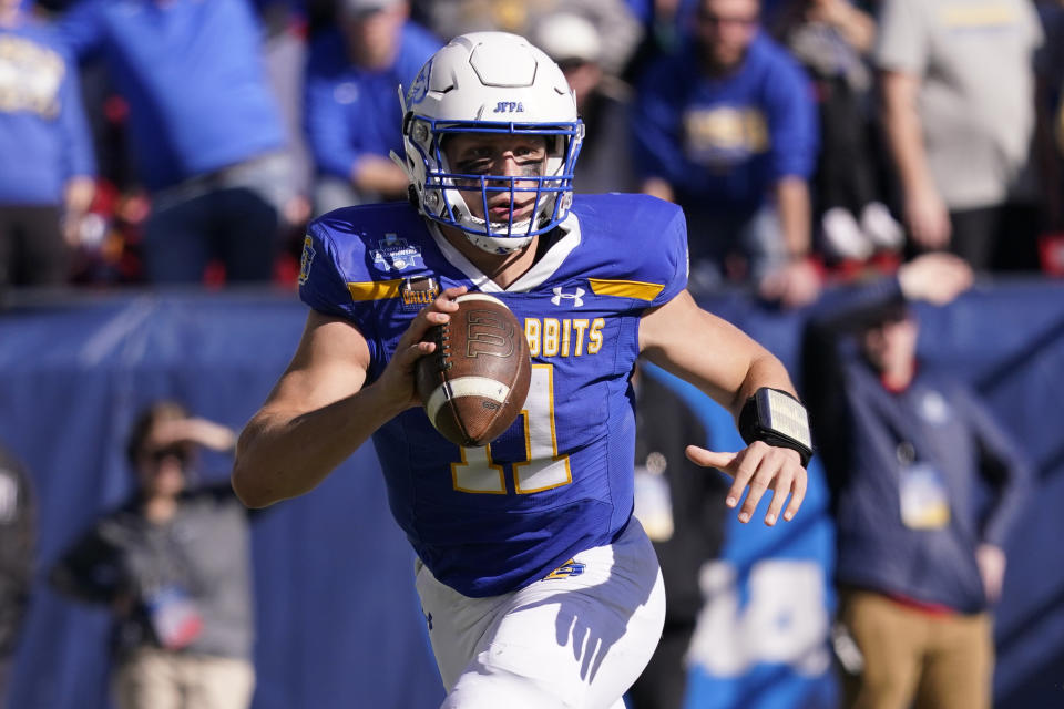 CORRECTS TO NORTH DAKOTA STATE NOT NORTH DAKOTA - South Dakota State quarterback Mark Gronowski (11) looks to pass during the first half of the FCS Championship NCAA college football game against the North Dakota State, Sunday, Jan. 8, 2023, in Frisco, Texas. (AP Photo/LM Otero)