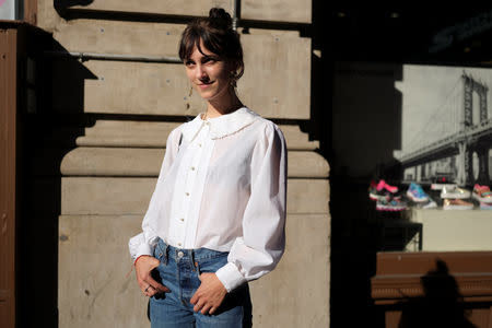 Kat McClanahan, 23, a Merchandising Manager at Aritzia, poses for a portrait in the Manhattan borough of New York, U.S., September 3, 2018. REUTERS/Caitlin Ochs