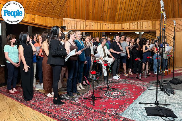 <p>Dave Quinn</p> Aaron Lazar (center) recording "The Impossible Dream" with a sea of Broadway stars