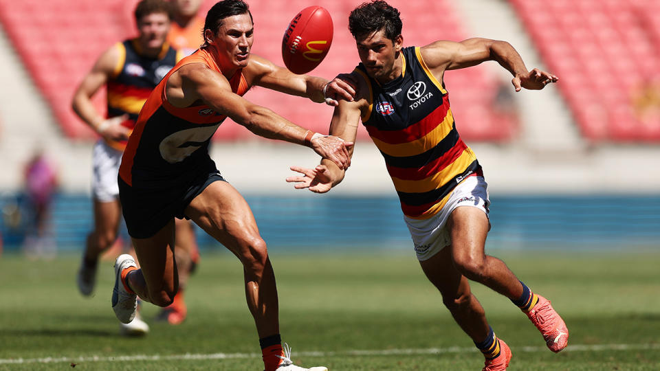 Shane McAdam competes for the ball during the round one AFL match against the GWS Giants.