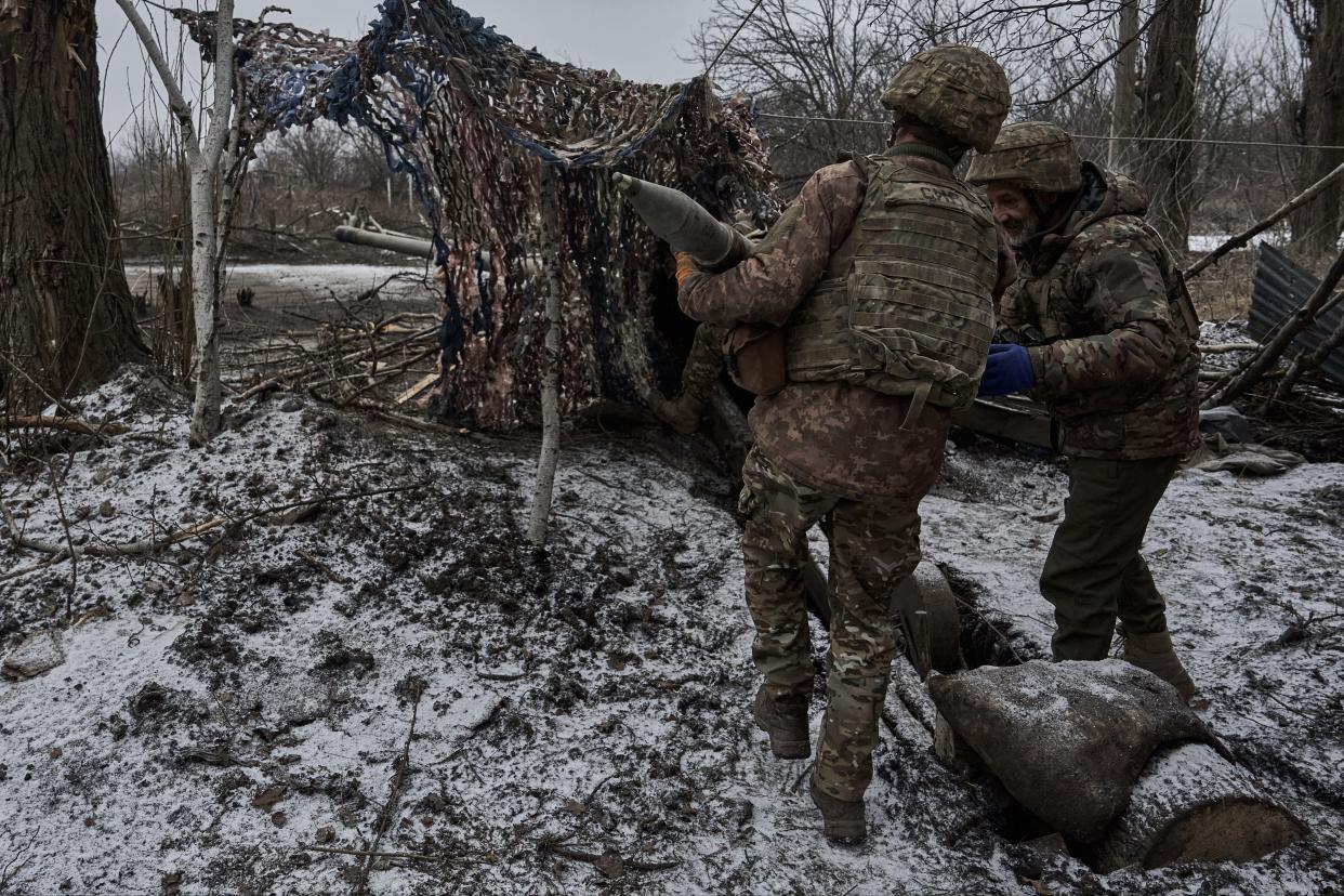 Ukrainian military soldiers fire from the MT-12 or 2A29 gun ‘Rapira' is a Soviet smoothbore 100-mm anti-tank gun on December 7, 2023 in Avdiivka (Getty Images)