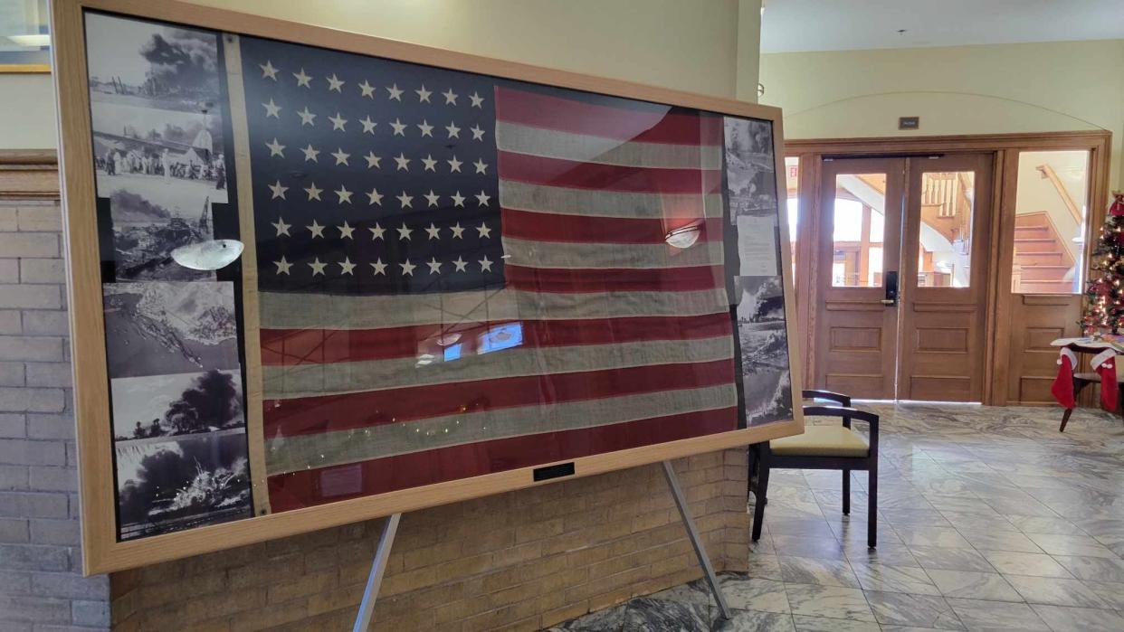 The Pearl Harbor flag is in a frame and on display at the Historic Henderson County Courthouse. The flag flew on Dec. 7, 1941, at Pearl Harbor during the Japanese attack.