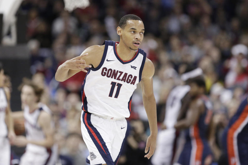 Gonzaga guard Nolan Hickman celebrates his basket against Pepperdine during the first half of an NCAA college basketball game Thursday, Jan. 4, 2024, in Spokane, Wash. (AP Photo/Young Kwak)