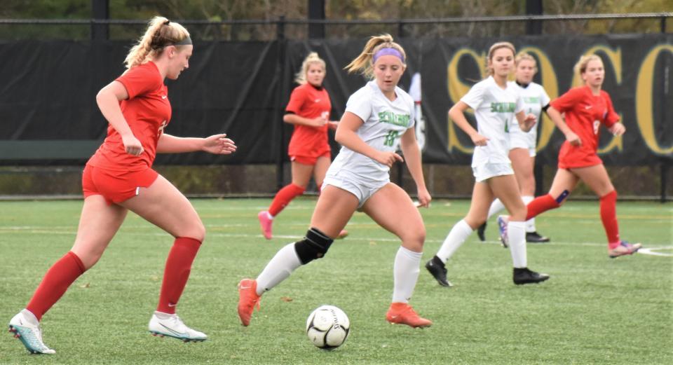 New Hartford Spartan Kate Noonan advances the ball against Schalmont during Saturday's Class A regional.