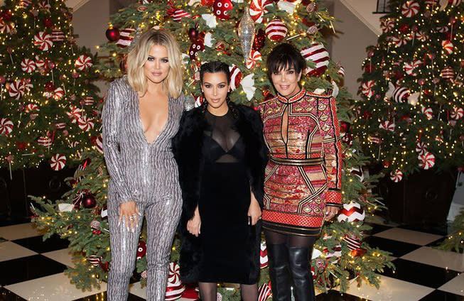 Khloe Kardashian with sister Kim Kardashian West and mom Kris Jenner. (Photo: Courtesy Kim Kardashian West app)