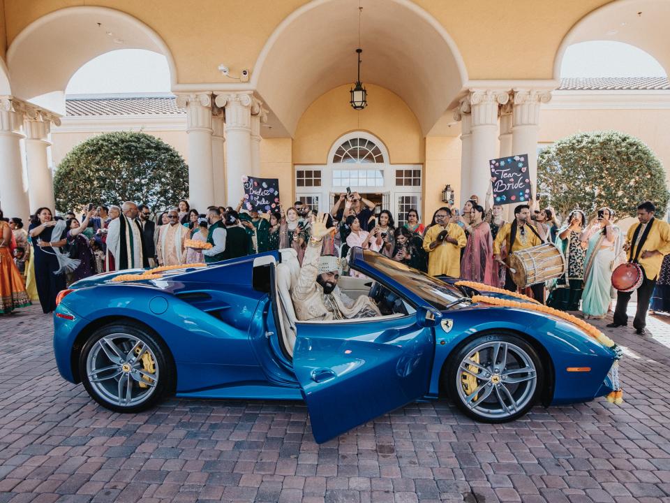 Sanjay Balgobin coming out of a Ferrari on his wedding day
