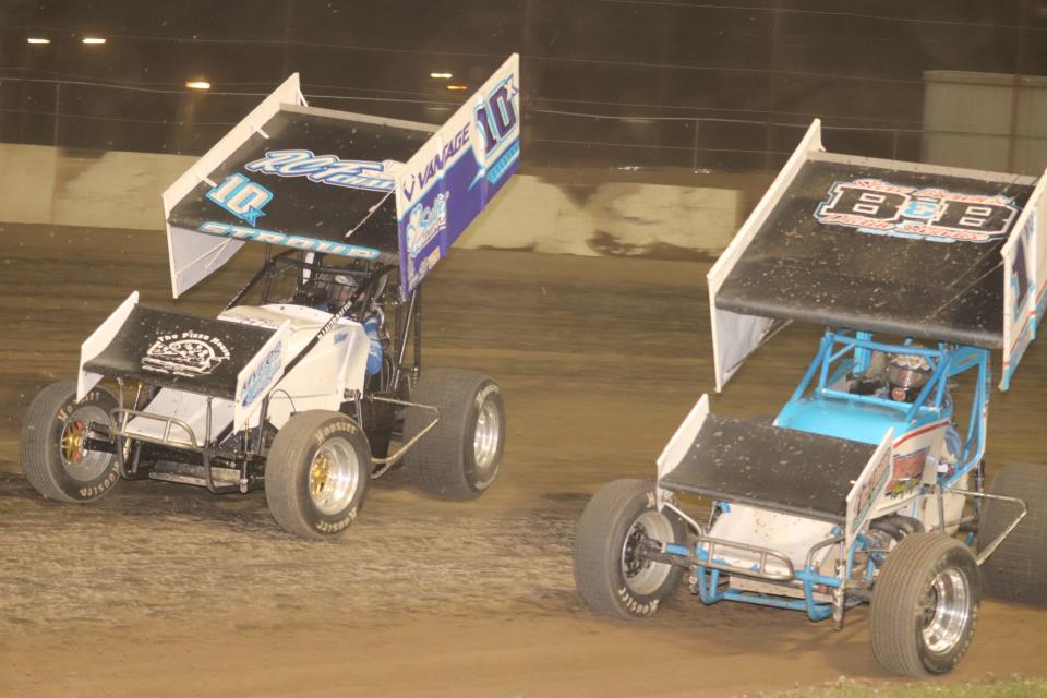 Paul Weaver, left, battles Dustin Stroup for the lead. Weaver earned his 74th career victory at Fremont Speedway. Weaver is two wins away from tying Art Ball on the all-time list.