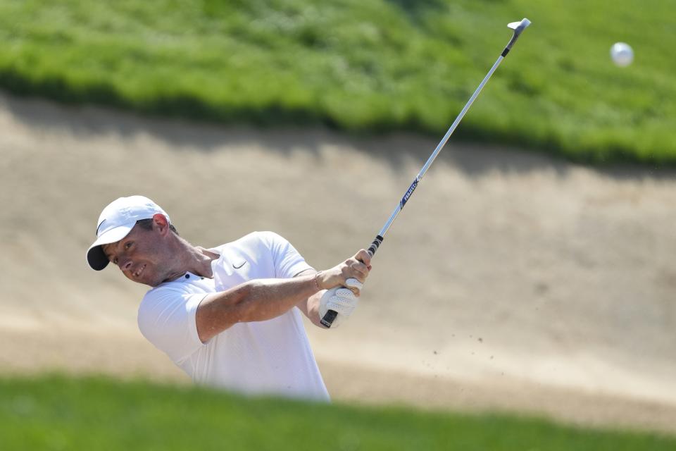 Rory McIlroy of Northern Ireland plays his second shot on 1st hole during the final round of the Hero Dubai Desert Classic golf tournament, in Dubai, United Arab Emirates, Sunday, Jan. 21, 2024. (AP Photo/Kamran Jebreili)