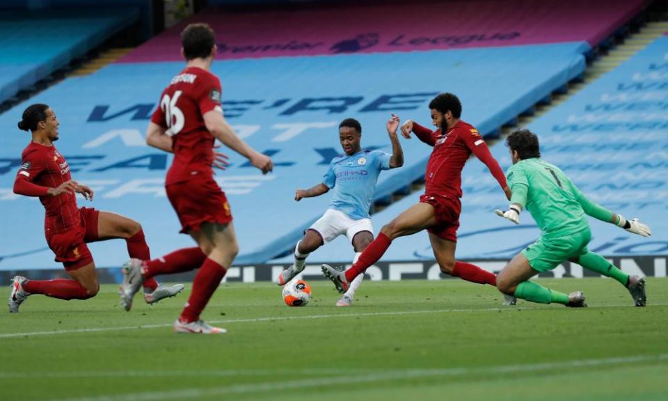 Raheem Sterling turns inside Joe Gomez to double Manchester City’s lead.