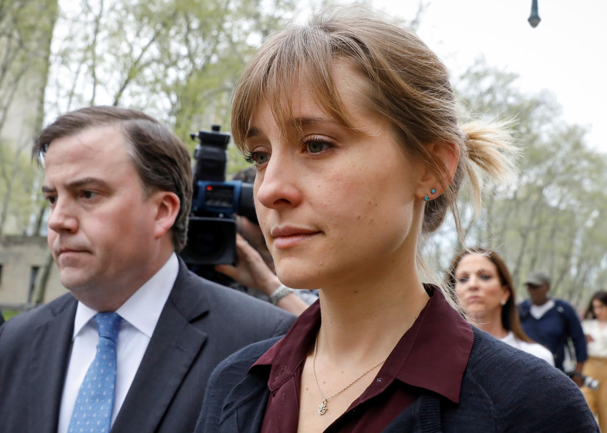 Actor Allison Mack, known for her role in the TV series 'Smallville', exits with her lawyer following a hearing on charges of sex trafficking in relation to the Albany-based organization Nxivm at United States Federal Courthouse in Brooklyn, New York, U.S., May 4, 2018. REUTERS/Brendan McDermid