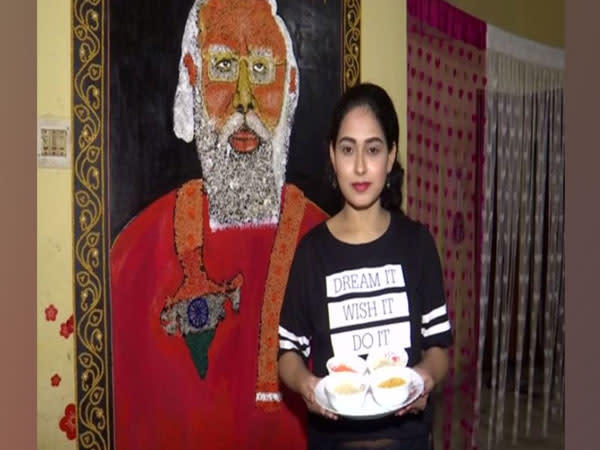 Priyanka Sahani with Prime Minister Narendra Modi's portrait (Photo/ANI)