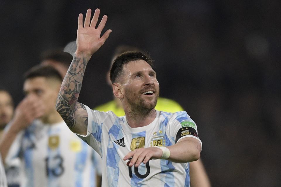 TOPSHOT - Argentina's Lionel Messi celebrates after the South American qualification football match for the FIFA World Cup Qatar 2022 between Argentina and Venezuela at La Bombonera stadium in Buenos Aires on March 25, 2022. (Photo by JUAN MABROMATA / AFP) (Photo by JUAN MABROMATA/AFP via Getty Images)