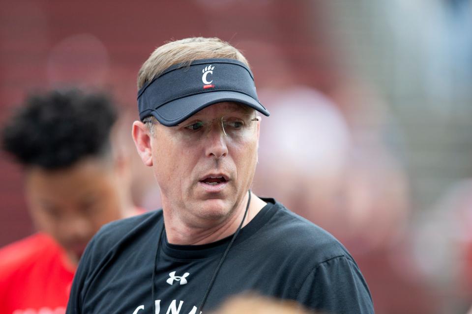 Cincinnati head coach Scott Satterfield talks to the football team at the end of the Bearcats' spring scrimmage at Nippert Stadium on April 15.