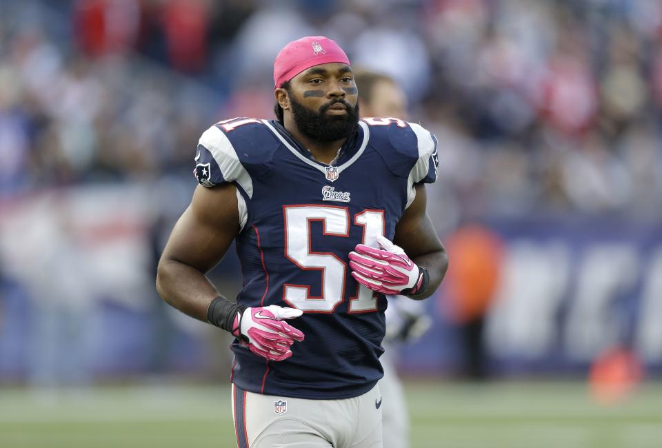 FILE -New England Patriots outside linebacker Jerod Mayo (51) warms up on the field before an NFL football game against the New Orleans Saints, Sunday, Oct.13, 2013, in Foxborough, Mass. The New England Patriots have agreed to hire Jerod Mayo to succeed Bill Belichick as their next head coach, according to a person familiar with the situation. Details were still being worked out on Friday, Jan. 12, 2024, according to the person, who spoke on the condition of anonymity because the team hasn't announced the decision. (AP Photo/Steven Senne, File)