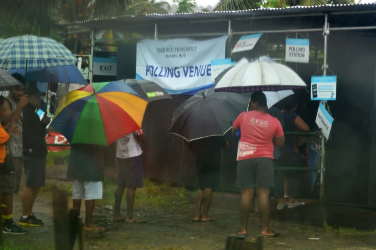 Turnout was as low as 53 percent in some districts, with many voters deciding against braving the tropical downpours to cast their ballot