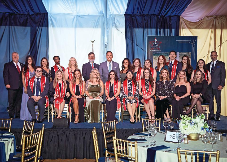 David Kim (back row, center) with scholarship recipients and supporters