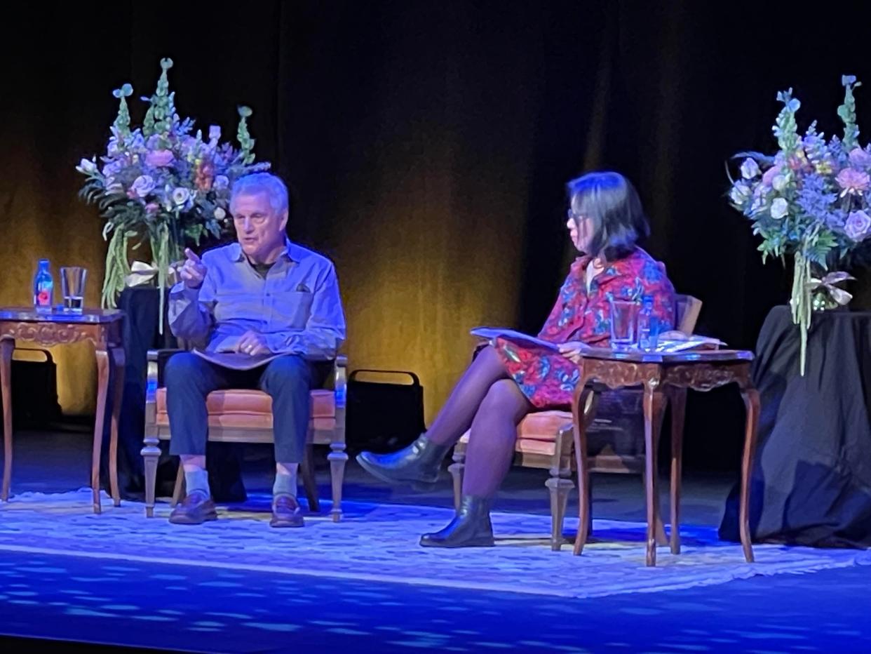 One of the defining voices in American literature, John Irving (left), recalled his deep Iowa City ties Friday, Oct. 13 in a wide-ranging talk that delighted a sold-out Hancher Auditorium audience