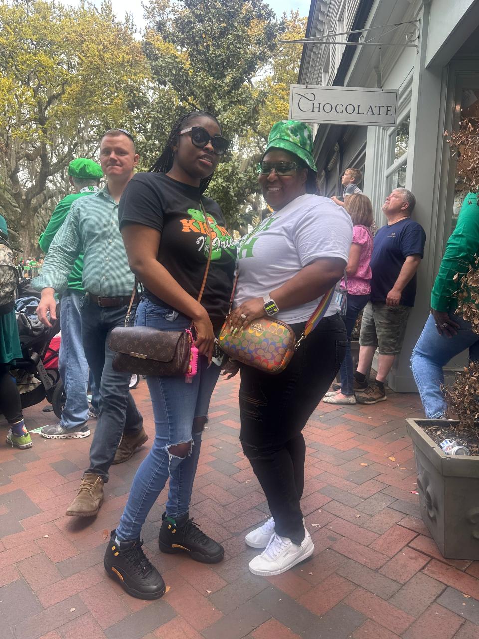 Juanita Baskin (left) and Kesha Smart (right) are visiting from Jacksonville, Florida. The cousins have plans to party on River Street this evening.