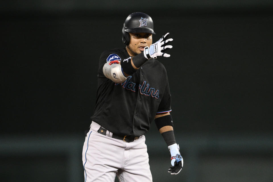 Miami Marlins' Luis Arraez gestures on second after he doubled during the third inning of the team's baseball game against the Washington Nationals, Friday, Sept. 1, 2023, in Washington. (AP Photo/Nick Wass)