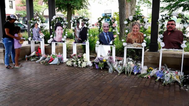 PHOTO: Visitors pay their respects at altars for the seven people killed in Monday's Fourth of July mass shooting, July 7, 2022, in Highland Park, Ill. (Nam Y. Huh/AP)