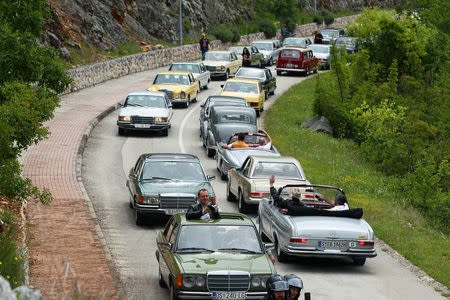 Old-timer Mercedes cars are seen driving in Imotski, Croatia, May 19, 2019. REUTERS/Antonio Bronic