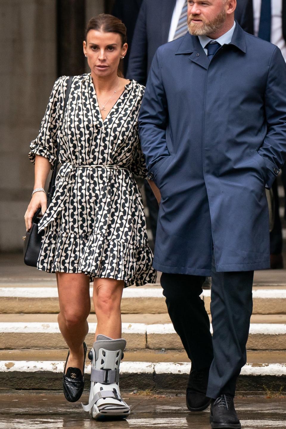 Coleen Rooney and Wayne Rooney leave the Royal Courts of Justice (Aaron Chown/PA) (PA Wire)