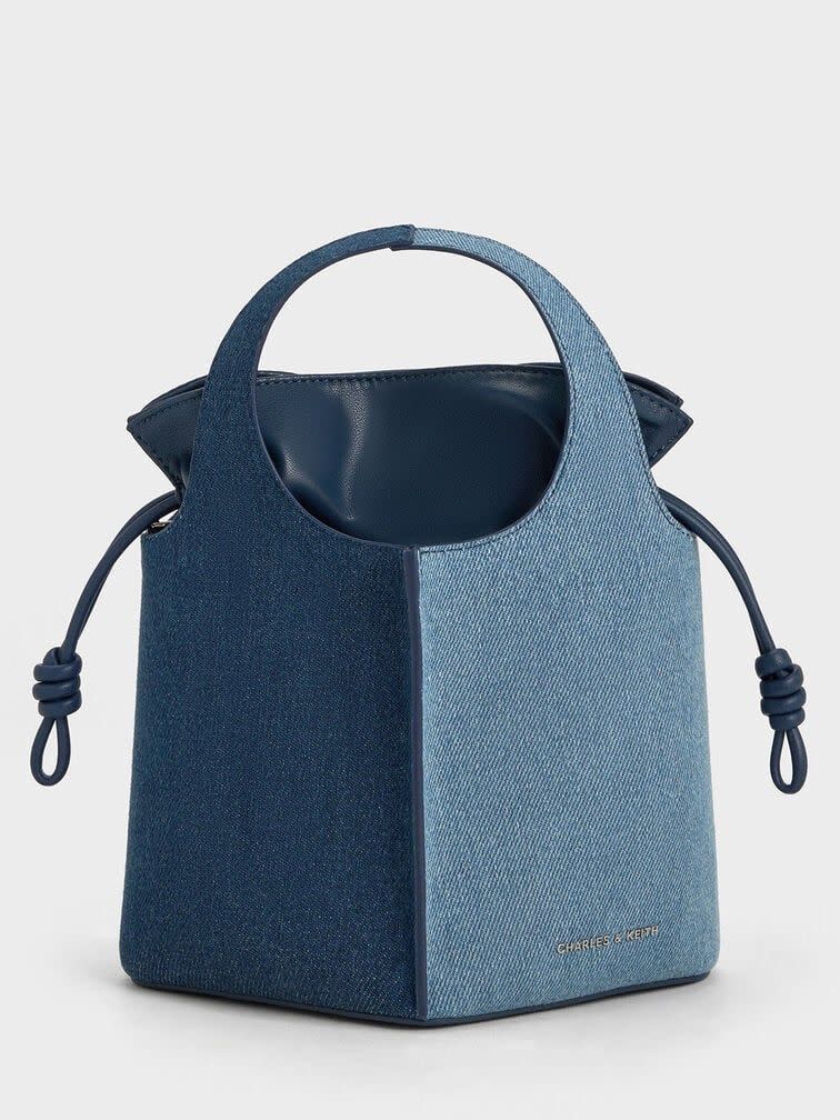 <p><a href="https://go.redirectingat.com?id=74968X1596630&url=https%3A%2F%2Fwww.charleskeith.com%2Fus%2FCK2-10671633-1_DN.BLU.html&sref=https%3A%2F%2Fwww.townandcountrymag.com%2Fstyle%2Ffashion-trends%2Fa46106296%2F2024-bag-trends%2F" rel="nofollow noopener" target="_blank" data-ylk="slk:Shop Now;elm:context_link;itc:0;sec:content-canvas" class="link rapid-noclick-resp">Shop Now</a></p><p>Arlys Denim Bucket Bag</p><p>charleskeith.com</p><p>$73.00</p>