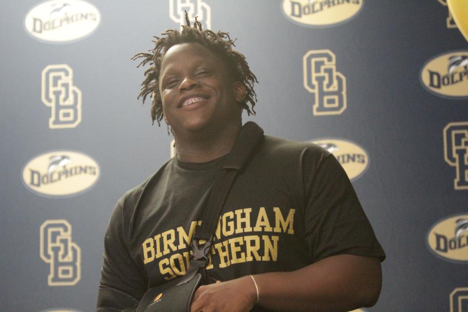 Gulf Breeze football senior Shamane Walker addresses the crowd during a signing ceremony at Gulf Breeze High School on Thursday, March 7, 2024.