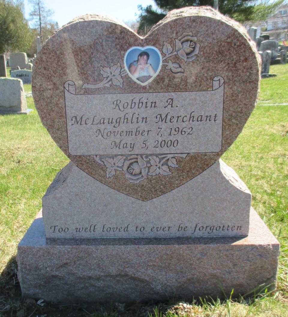 The South Cemetery marker of Robbin McLaughlin Merchant (1962-2000) is not far from the burial site of five of her siblings who died in a fire in 1968 in Portsmouth.