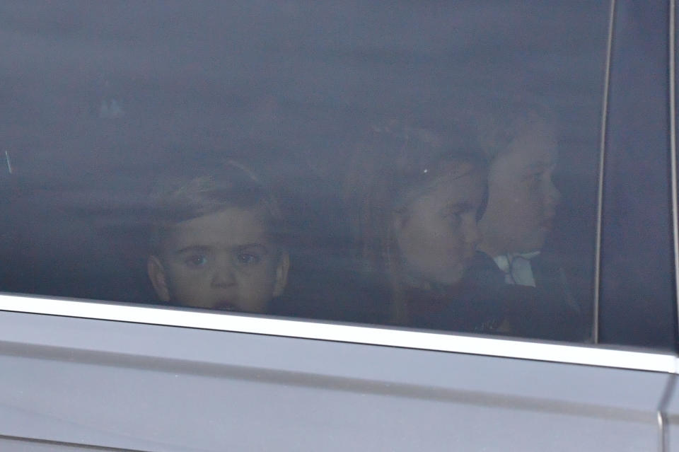 (left to right) Prince Louis, Princess Charlotte and Prince George leaving the Queen's Christmas lunch at Buckingham Palace, London.