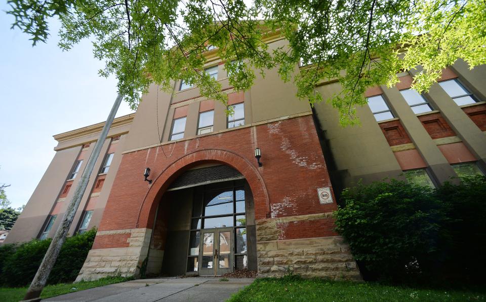 Irving Elementary School, shown here in June, covers 60,600 square feet on four acres at West 24th and Plum Streets in Erie. Opened in 1897 and closed by Erie School District officials following the 2011-2012 school year, the building is back up for sale after a deal between the school district and a developer fell through.