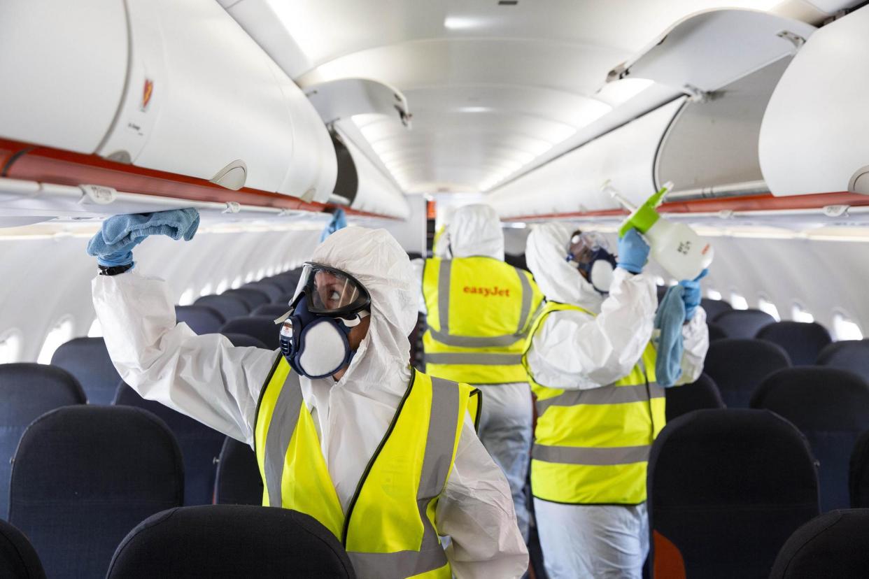 A file picture of staff cleaning an EasyJet plane at Gatwick Airport: PA