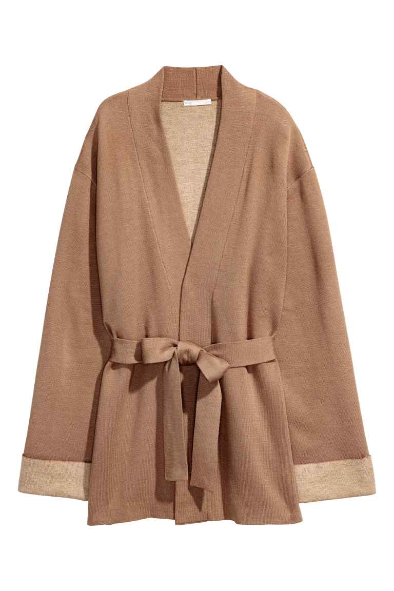 <p>Look no further than H&M for the most covetable cardies of the season. We have a particular soft spot for this camel number complete with a tie-belt. What more could you possibly want? <em><a rel="nofollow noopener" href="http://www2.hm.com/en_gb/productpage.0539241004.html" target="_blank" data-ylk="slk:H&M;elm:context_link;itc:0;sec:content-canvas" class="link ">H&M</a>, £39.99</em> </p>