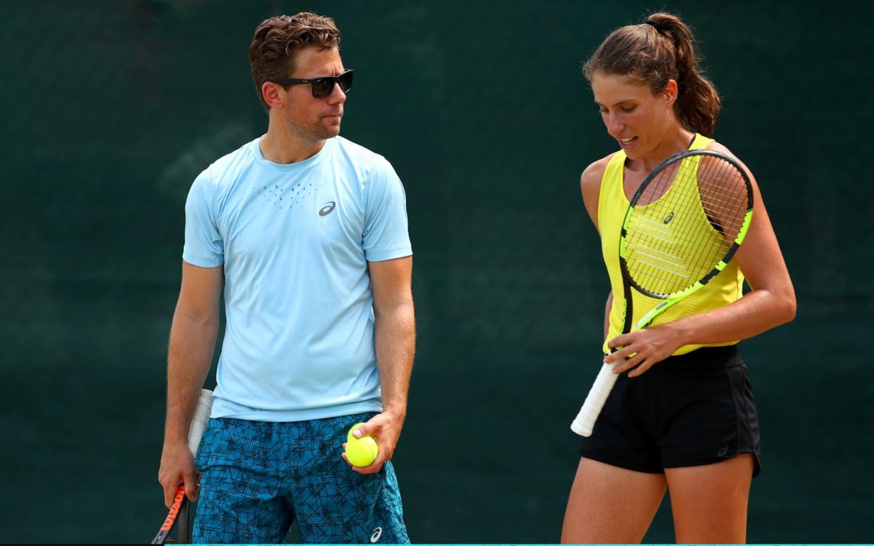 Johanna Konta (R) and Wim Fissette talk tactics at Wimbledon in July - Getty Images Sport