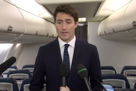 Canada's Prime Minister Justin Trudeau apologizes for wearing brownface makeup in 2001