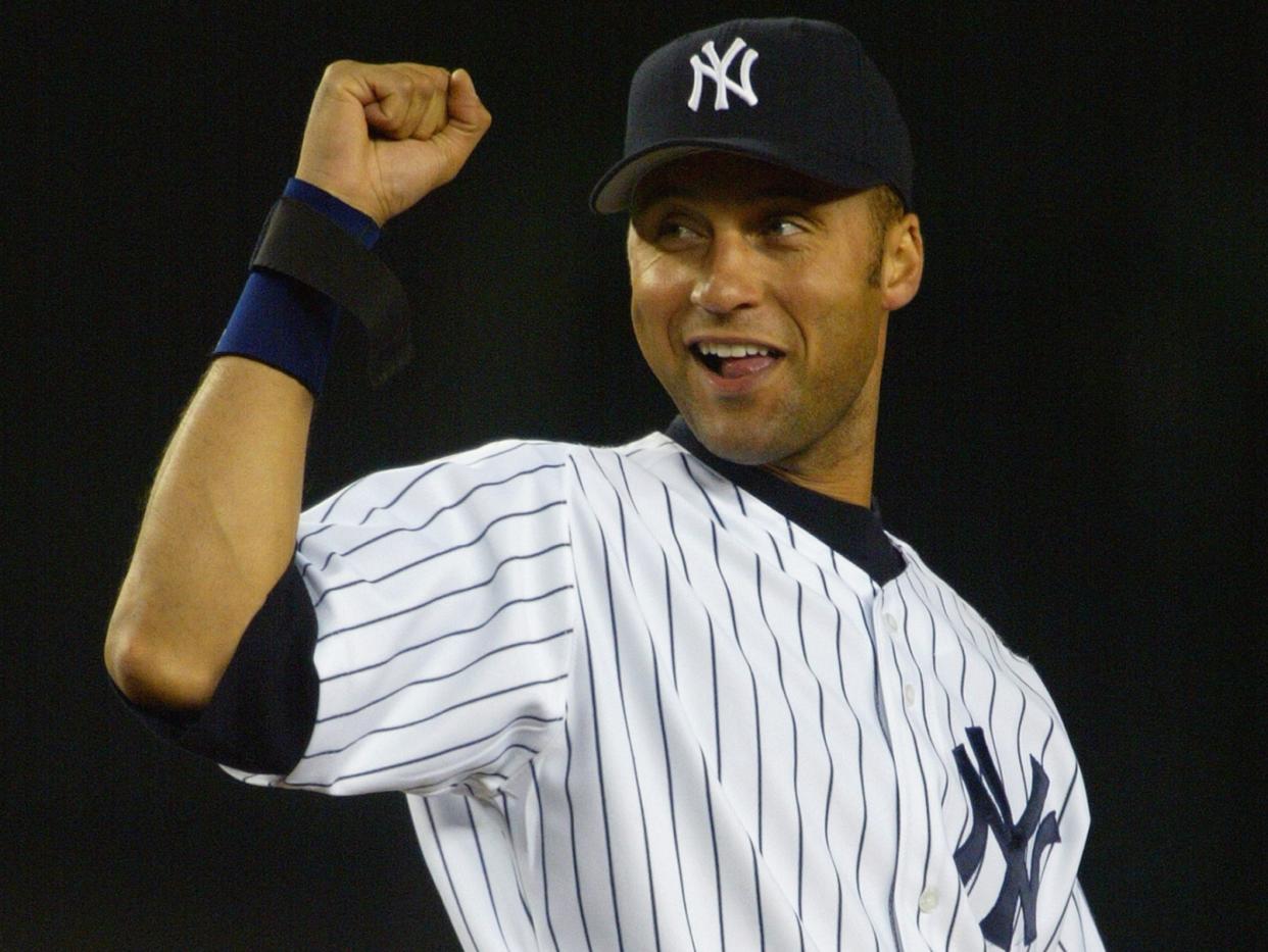 Derek Jeter celebrates a play during the 2004 Yankees game in which he broke his hitting slump.