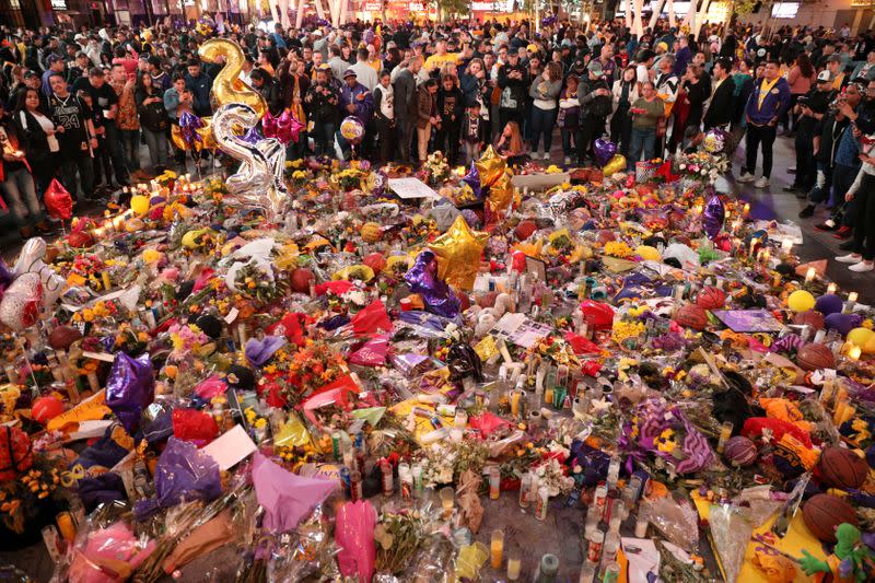 Mourners gather outside Staples Center before a Los Angeles Lakers home game to pay respects to Kobe Bryant