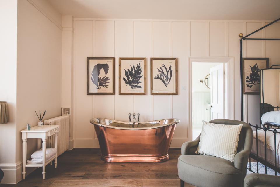 copper bath with nickel interior in traditional bedroom