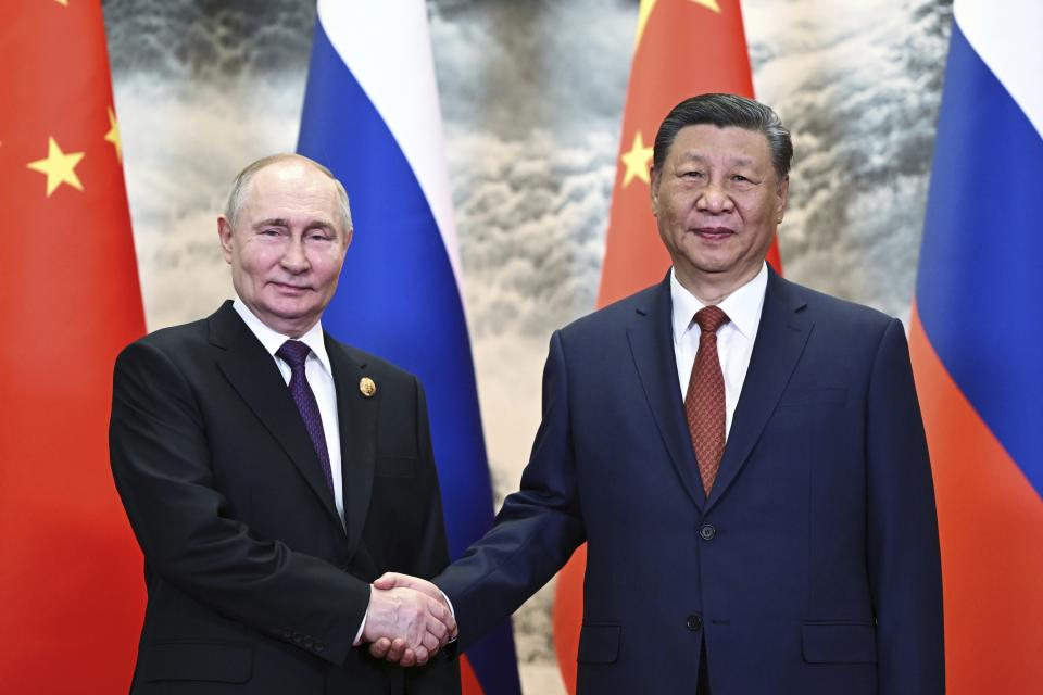 Chinese President Xi Jinping, right, and Russian President Vladimir Putin pose for a photo prior to their talks in Beijing, China, on Thursday, May 16, 2024. (Sergei Guneyev, Sputnik, Kremlin Pool Photo via AP)