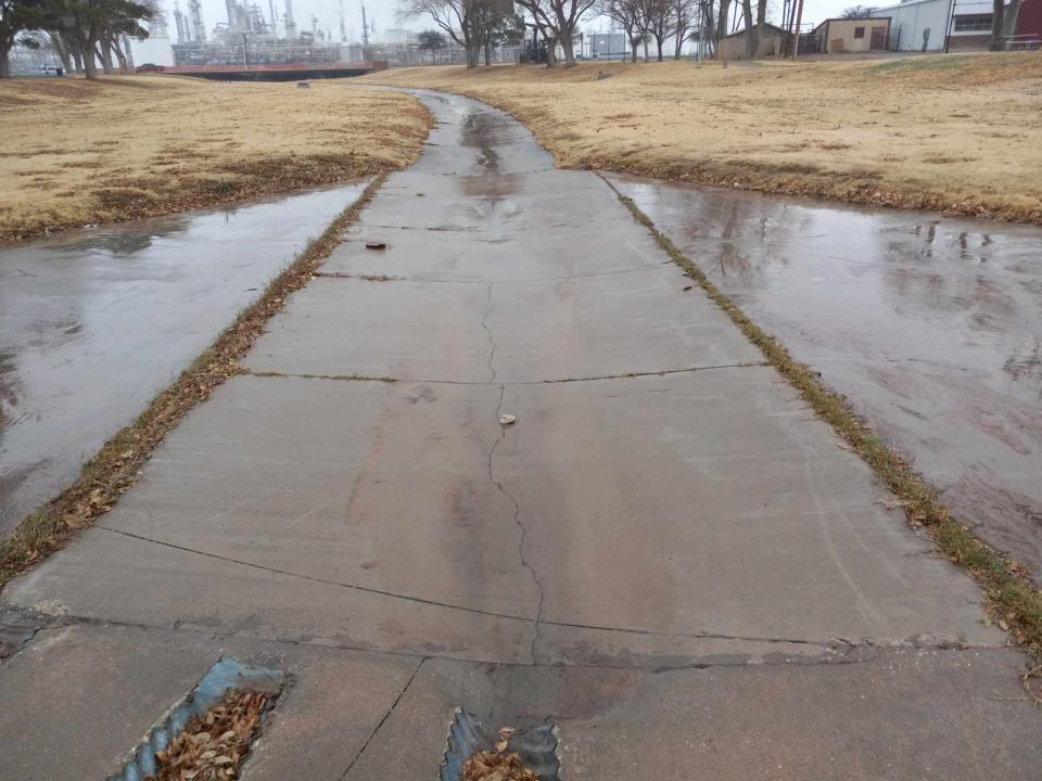 Rain water trickles through the Eagle Draw Flood Channel in Artesia on Dec. 13, 2023. Rain chances were good for Eddy County.