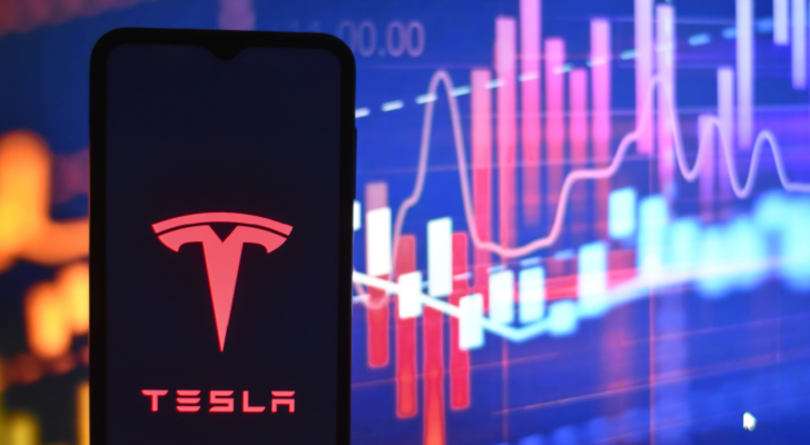 Tesla (TSLA) logo on a smartphone screen stock image. Tesla is an innovative company focused on producing sustainable electric vehicles and clean energy solutions