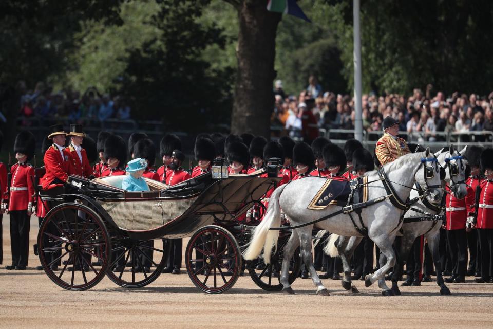 <p>The Queen arriving to inspect her troops.</p>